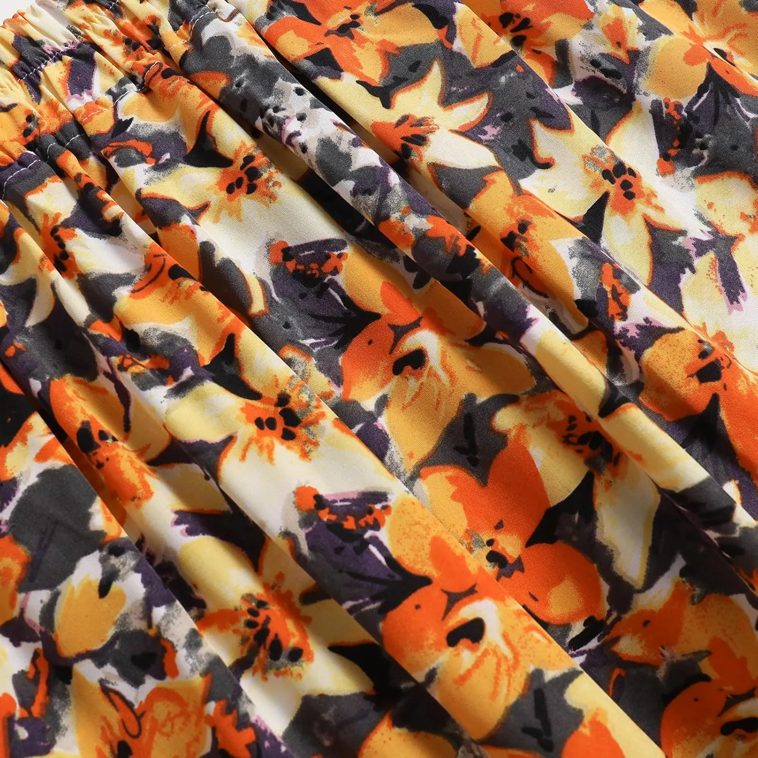 Women's Printed Skirt with Elastic Waist Broken Pleated Skirt with Pockets in Spring Summer and Autumn