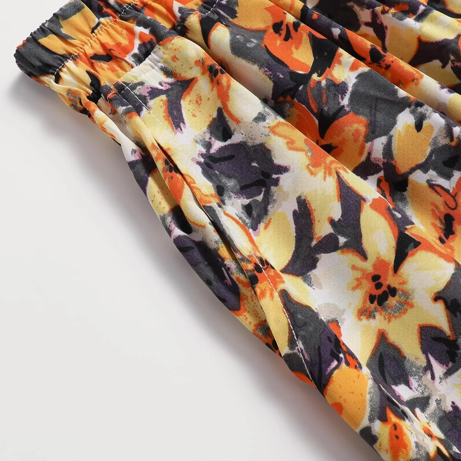 Women's Printed Skirt with Elastic Waist Broken Pleated Skirt with Pockets in Spring Summer and Autumn
